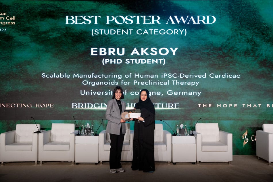 Ebru Aksoy receiving the Best Poster Award at the 3rd Dubai Stem Cell Congress